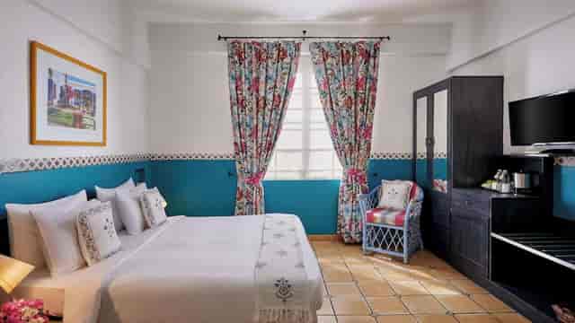 "Elegant hotel room at The Gordon House, perfect for business meetings and retreats."