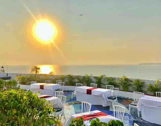 Outdoor event space at Allamanda Terrace with sunset views, perfect for receptions and dinners.