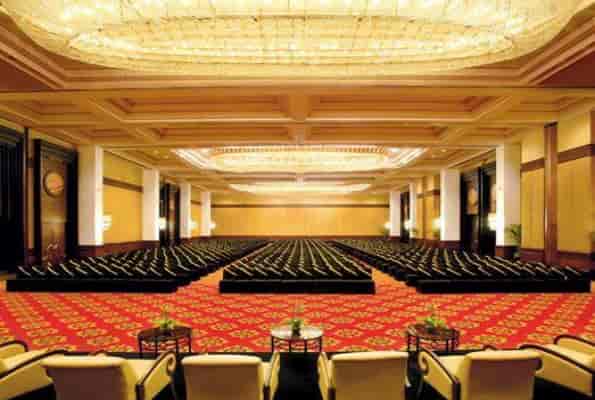 Elegant event hall at Renaissance Mumbai, ideal for conferences with plush seating.