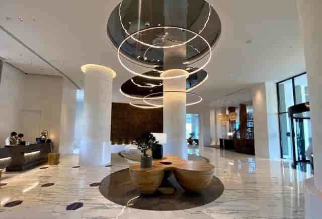 Modern lobby at Renaissance Mumbai, featuring elegant circular lighting for events.