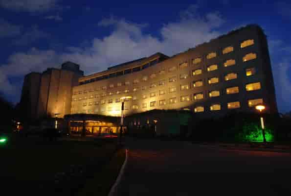Modern hotel exterior of The LaLiT Ashok Bangalore, perfect for events and meetings.