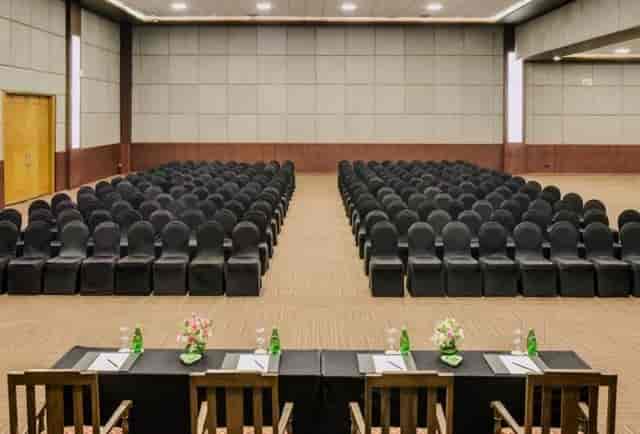 Conference room setup at The LaLiT Ashok Bangalore with sleek chairs for seminars.