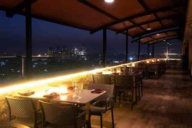 Elegant rooftop venue in Bangalore for upscale cocktail receptions and intimate dinners.
