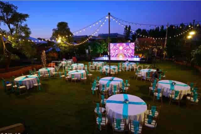 Opa - Banquet Hall outdoor setup with elegant tables for events and celebrations.