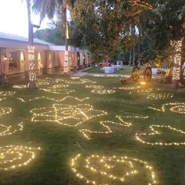 Elegantly illuminated outdoor event space at Moongate for weddings and corporate gatherings.