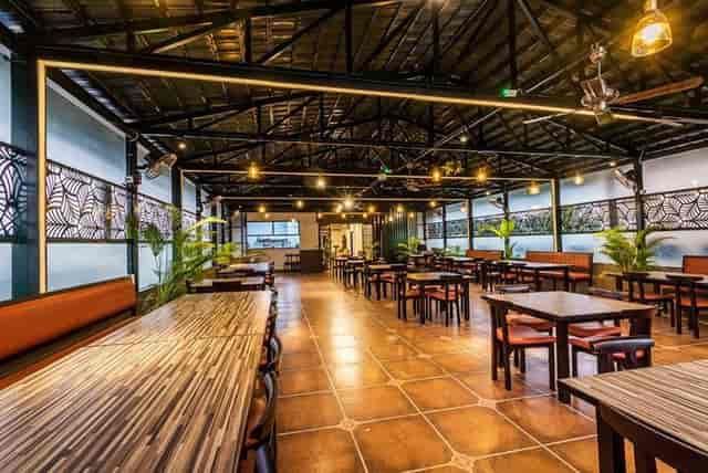 Tandoor Restaurant Banquet Hall, spacious venue with modern decor for corporate events.
