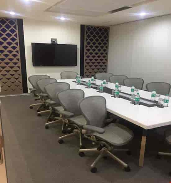 Modern conference room in Bangalore with large table, ideal for corporate events