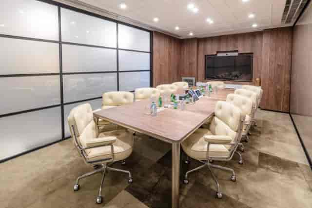 Modern conference room in Bangalore with ergonomic chairs for executive meetings.
