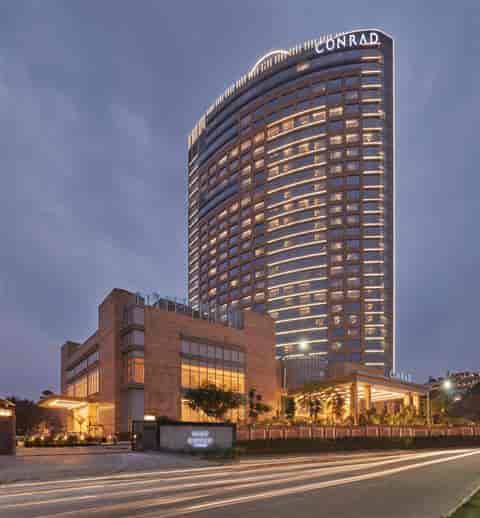 Executive Boardroom at Conrad Bengaluru, modern venue for conferences and events.