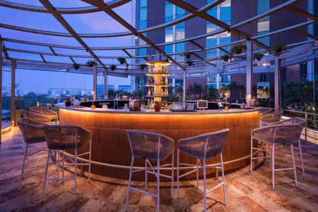 Stylish rooftop bar at Aloft Bengaluru ideal for upscale event gatherings with panoramic views.