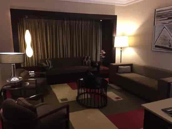 Stylish lounge area in JW Marriott Bengaluru for casual meetings and networking events.