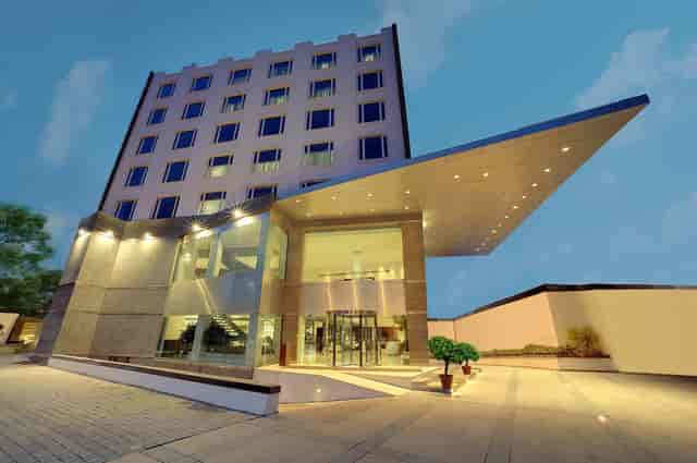 Modern hotel facade of Suites in Pride Hotel, Bangalore for corporate events and meetings.