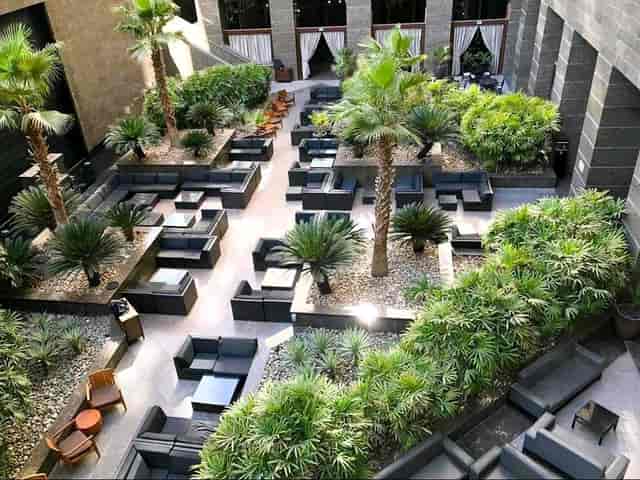 Outdoor lounge at The Ritz-Carlton, perfect for networking events and casual meet-ups.