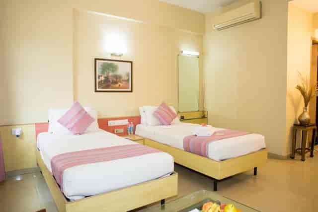 Conference center with twin beds at Pearl Suites Boutique Hotel for events and meetings.