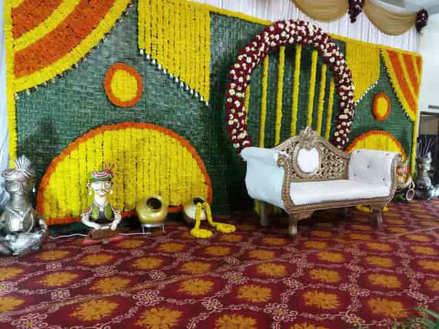 "Elegant floral backdrop at Prakruti Paradise for festive gatherings and celebrations."