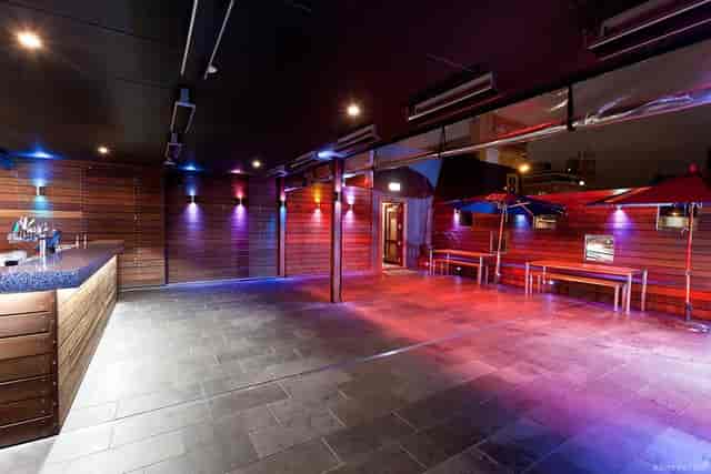 Modern rooftop bar at Arcadia Hotel, perfect for events with vibrant ambiance.