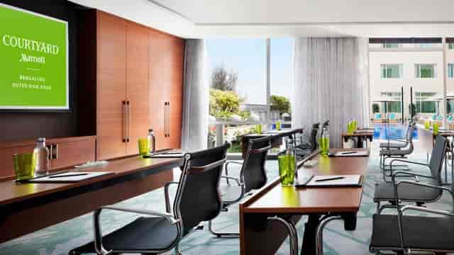 Modern conference room with sleek chairs, perfect for corporate events and meetings.