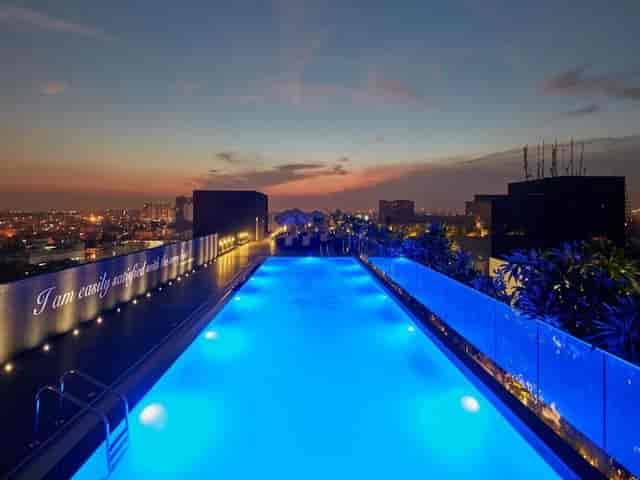 Rooftop pool at twilight in The Waverly Hotel, ideal for events and social gatherings.