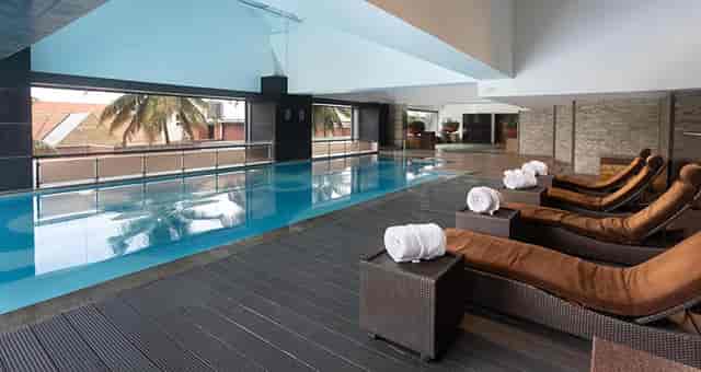 Indoor pool at Gokulam Grand Hotel & Spa, perfect for corporate retreats and wellness events.
