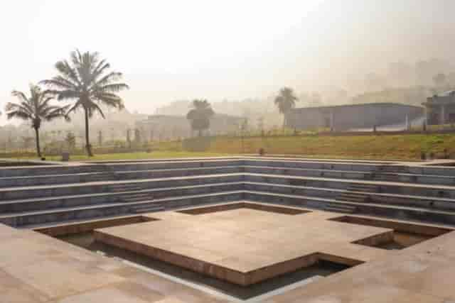 Serene outdoor venue in Amitarasa with tiered layout, ideal for corporate and social events.