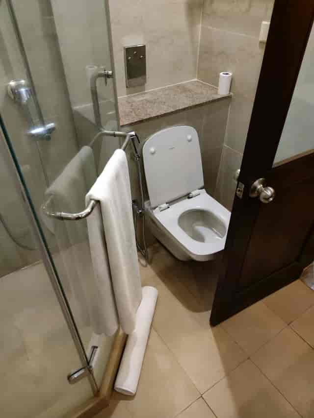 Magadh Hall restroom with modern toilet, ideal for events and meetings in Bangalore.