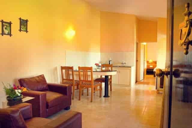 Cozy Premium Suite in Kodaikanal, ideal for intimate workshops and meetings.