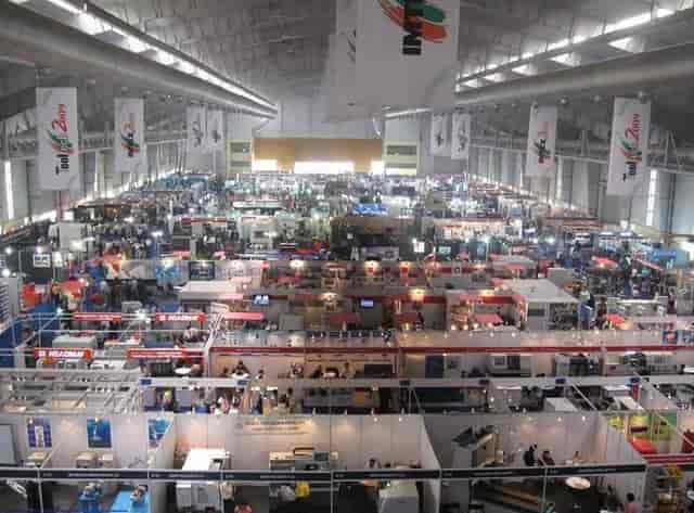 Bangalore Exhibition Centre Hall 3A: bustling trade show venue with vibrant displays.