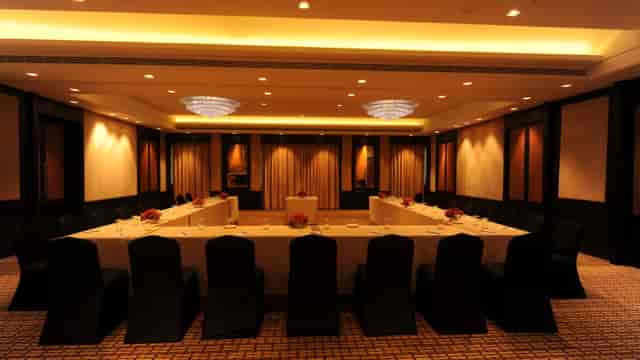 Corporate banquet setup in St. Marks Hotel, Bangalore, featuring elegant decor for meetings.