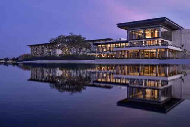 Conference Room in JW Marriott Bengaluru with large windows, perfect for corporate events.