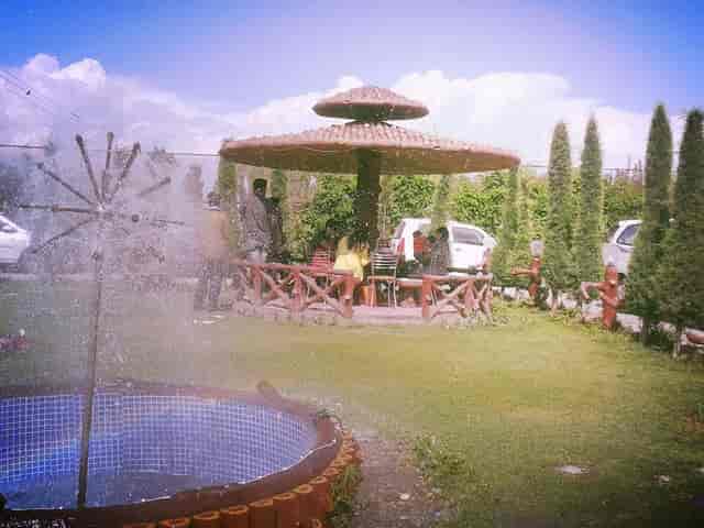 Outdoor event space at Marigold Resort with shaded gazebo for gatherings and meetings.