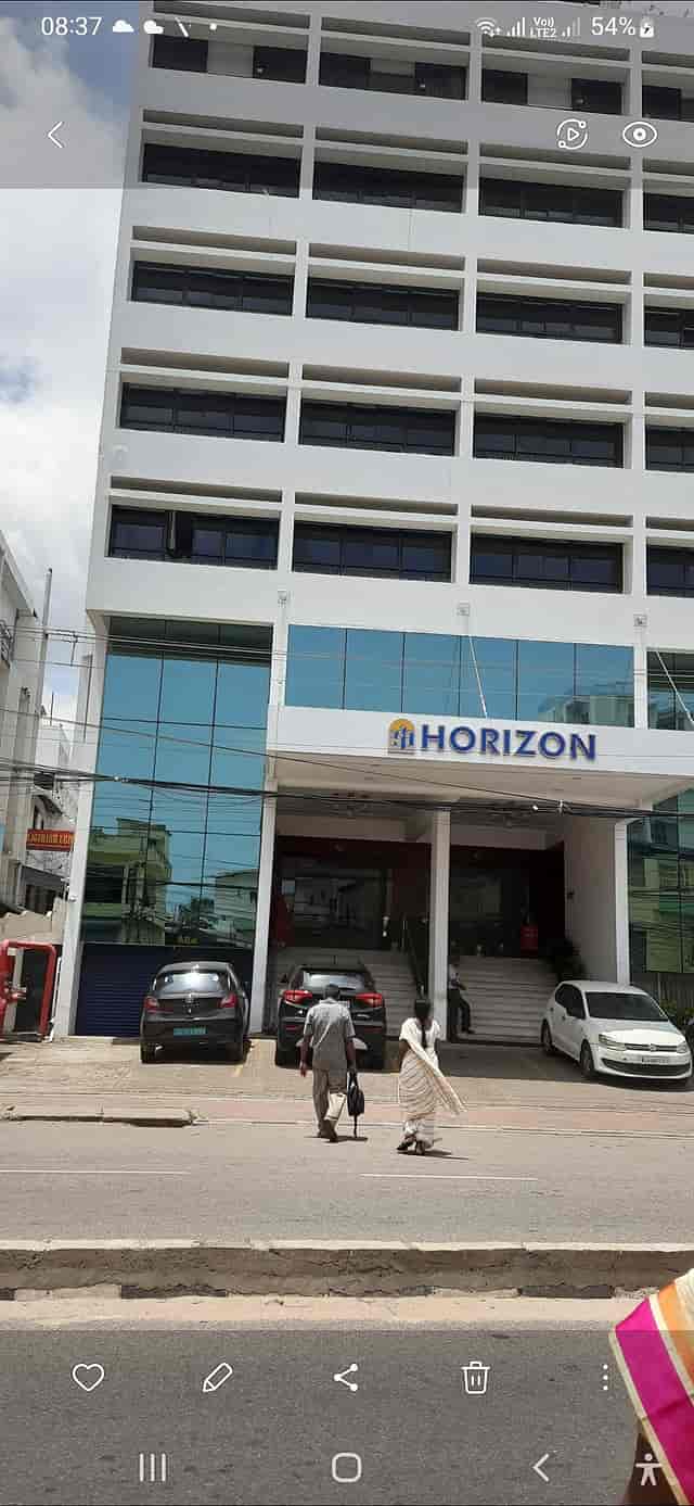 Modern event venue Menza in Hotel Horizon with large glass windows for corporate meetings.