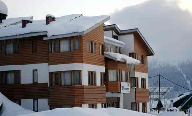 Cozy snow-covered Hotel Signature, perfect for winter retreats and corporate gatherings.