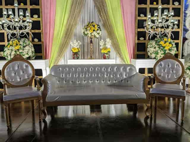 Elegant seating area with tufted sofa, ideal for luxurious event in Bukhara Royale.