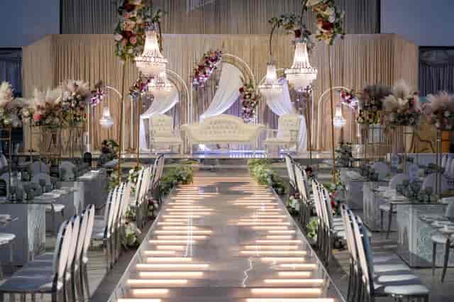 MyLahore Marquee: Elegant wedding venue with floral decor and chic chandeliers.