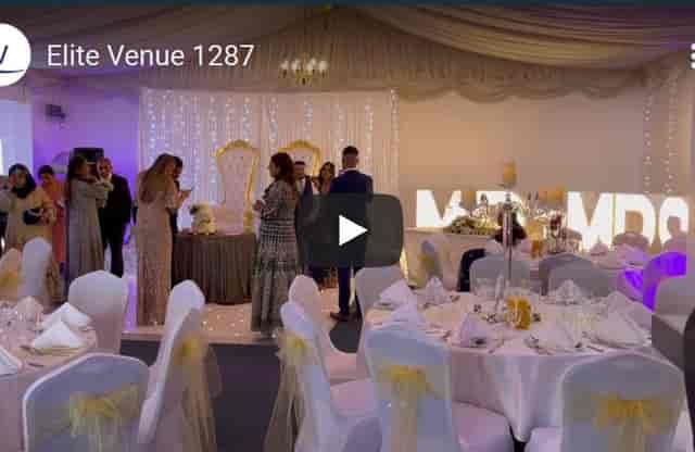 Elegant conference room with "MR & MRS" sign for intimate wedding celebration.