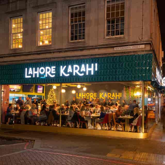 Lahore Karahi restaurant interior, vibrant atmosphere for networking and casual gatherings.