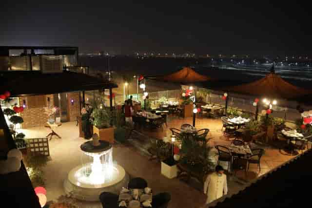 Rooftop restaurant in Spice Bazaar with fountain, ideal for upscale corporate events.