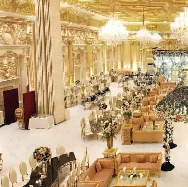 Opulent banquet hall with floral centerpieces, ideal for weddings and events.