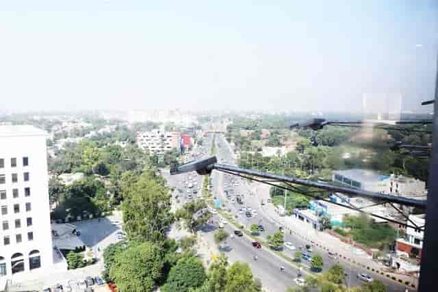 Executive Room in Shalimar Tower Hotel with panoramic urban view for corporate events.