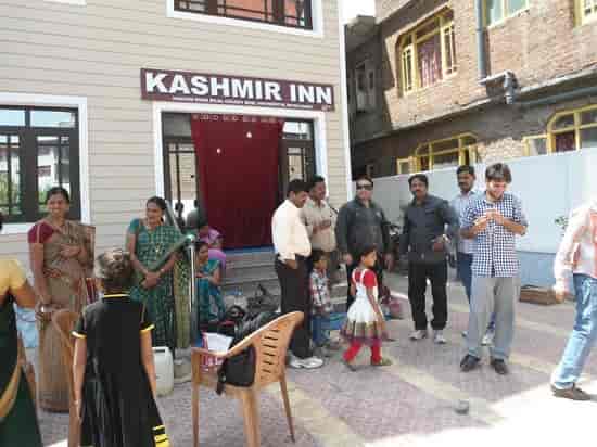 "Vibrant restaurant entrance at Hotel Kashmir Inn, perfect for events and gatherings."
