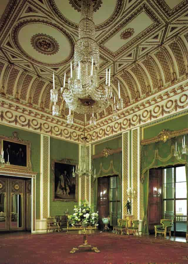 Elegant Green Room in Royal Mahal, featuring a grand chandelier for gala events.