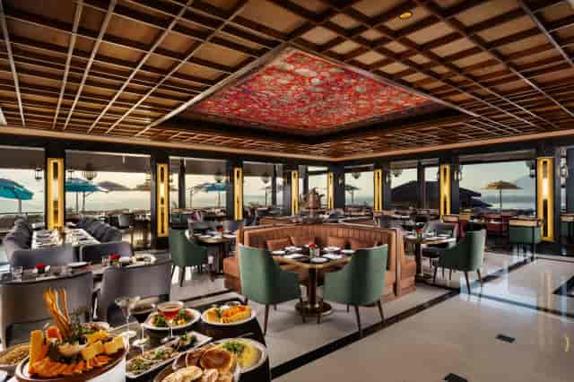 Elegant dining area at Taj Dal View, Srinagar for corporate meetings and VIP events.