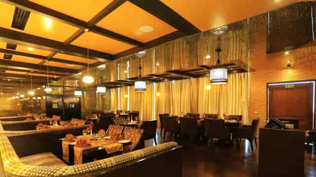 Sophisticated dining area at Taj Dal View, Srinagar for elegant gatherings and events.