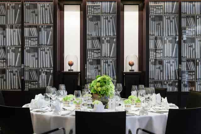 Private dining area with elegant table setting for corporate events at Sofitel Frankfurt Opera.
