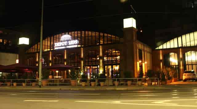 Illuminated beer garden at Depot 1899, ideal for evening corporate and social events.