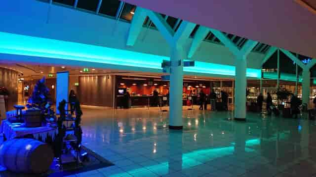 Congress Hotel at Sheraton Frankfurt Airport, modern venue with vibrant blue lighting for events.