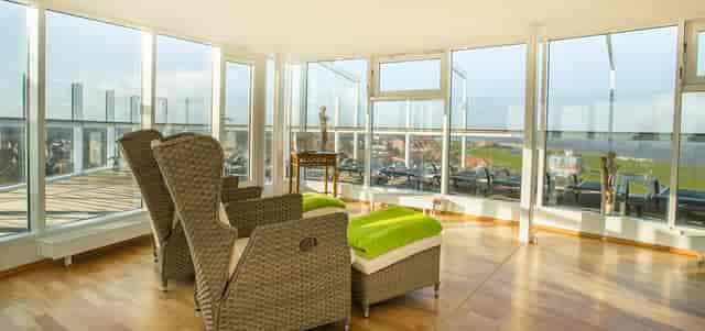 Rooftop pool at Hotel Fährhaus, modern meeting space for creative retreats and gatherings.