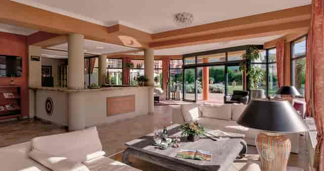 Casa Piazza lobby in Villa Toscana, inviting space for meetings and networking events.