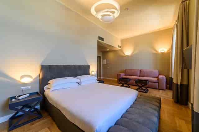 Private beach hotel room at Villa Paradiso, ideal for relaxing event accommodations.