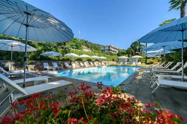 Serene private beach pool at Hotel Villa Paradiso for events and relaxation.